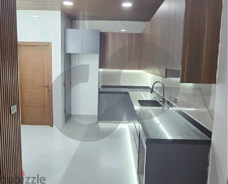 Modern apartment with luxurious finishes in Amchit/عمشيت REF#RS112394 7