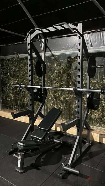 Power rack with life fitness bench