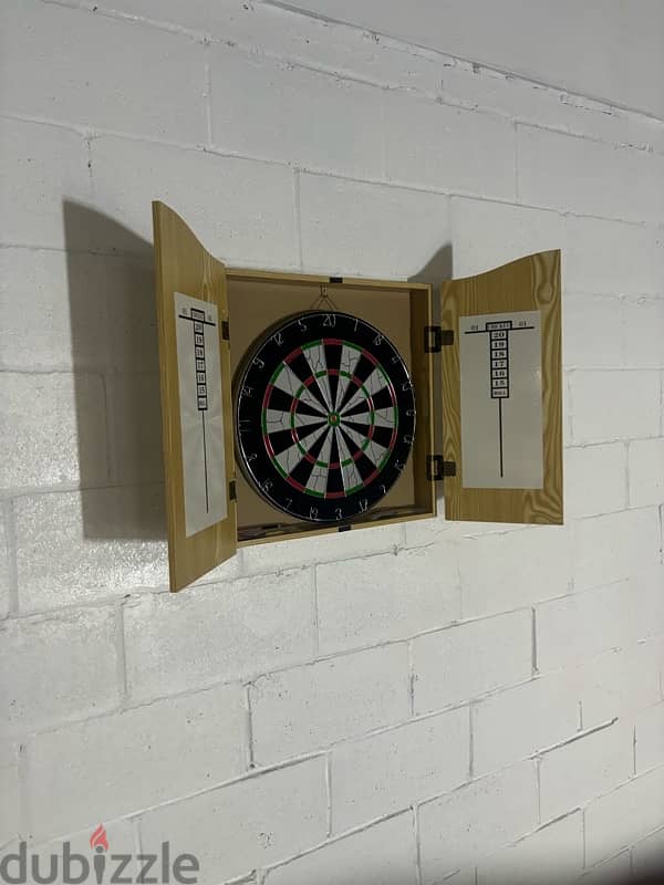 dart board with wood house 3