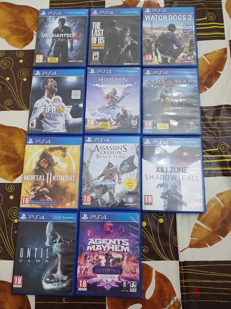 ps4 slim for sale with 2 controllers and 11 discs 1