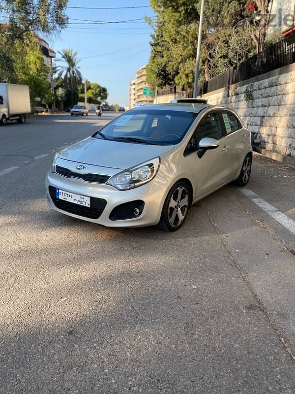 Kia Rio 2014 gs ajnabyih tesjela 3al 1500 0