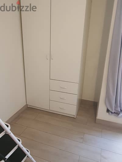 White closet in v gd condition