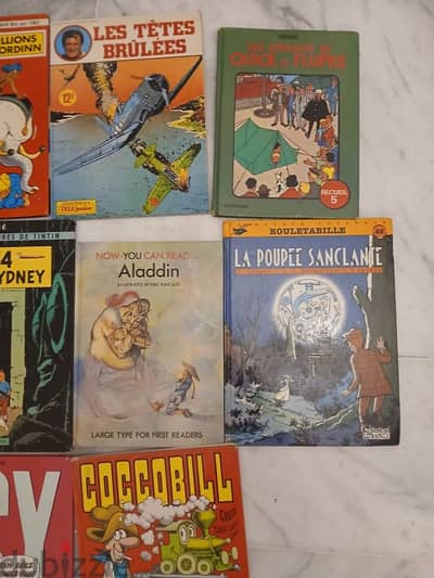 14 livres bandes dessinees en francais, tintin, asterix, quick, chick