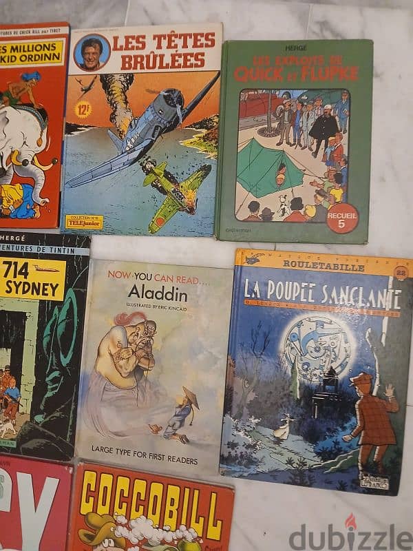 14 livres bandes dessinees en francais, tintin, asterix, quick, chick 4