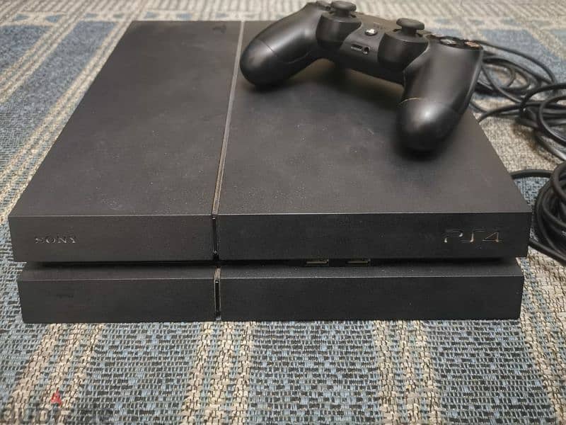 ps4 fat version 12.00 1000GB used like new + ps4 games for sale 1