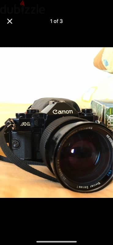 canon a1 with 2 prime lenses 0