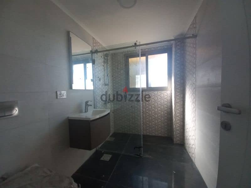 A 300m2 apartment with a sea and city view for sale in Beit Mery 12