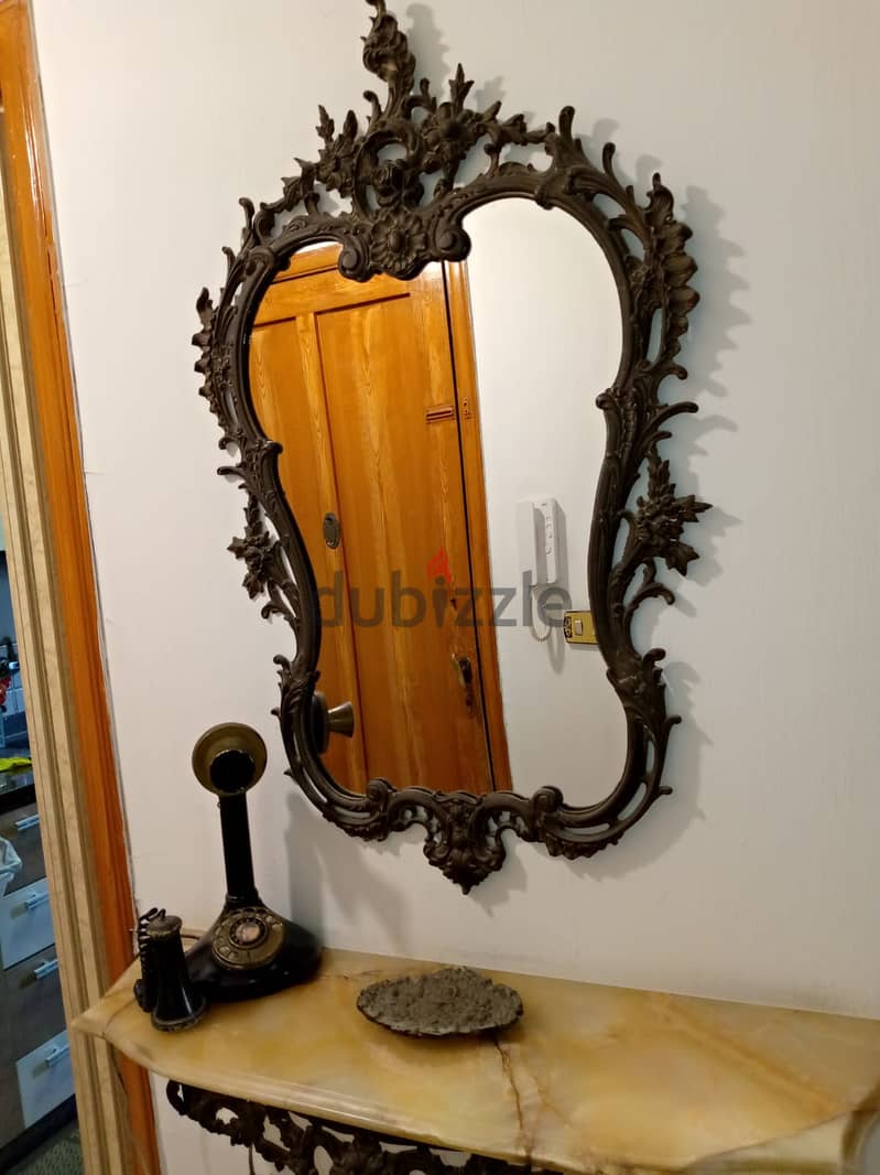 old copper mirror and onix table & old vintage phone 0