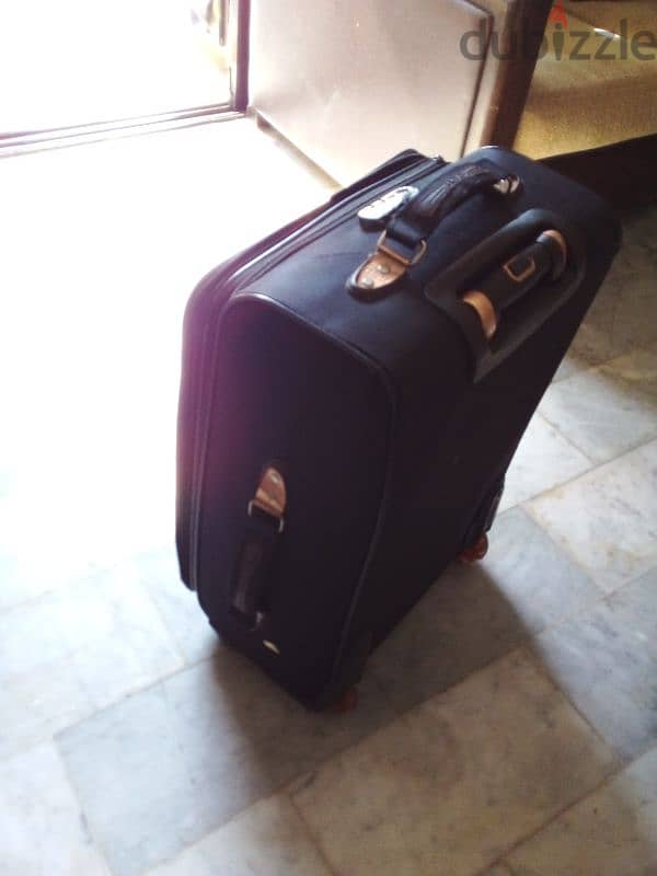 Suitcase شنطة سفر 0