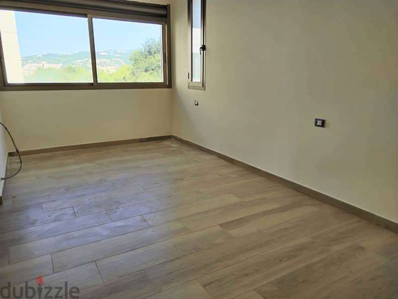 L16382-Bright Apartment For Sale in Ballouneh 2