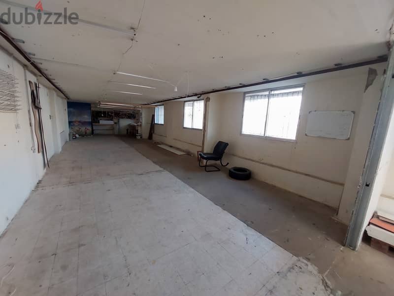 145 SQM Prime Location Shop in Dekwaneh, Metn 2