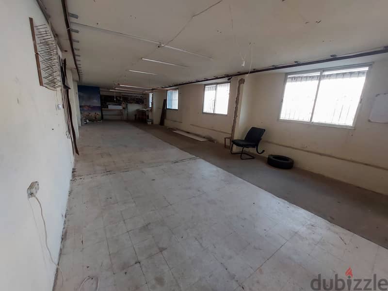 145 SQM Prime Location Shop in Dekwaneh, Metn 3