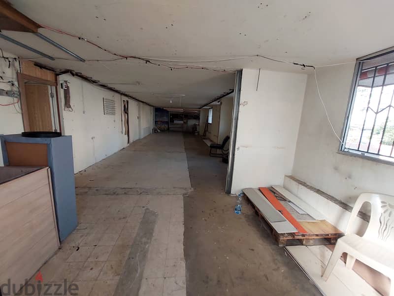 145 SQM Prime Location Shop in Dekwaneh, Metn 4