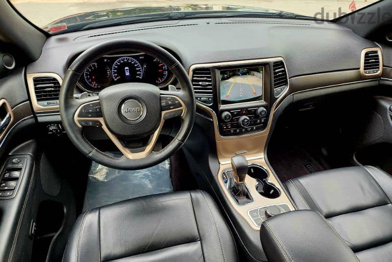 Grand Cherokee 2017 CLEAN CARFAX LIMITED V6 4WD اجنبي شبه جديد 15