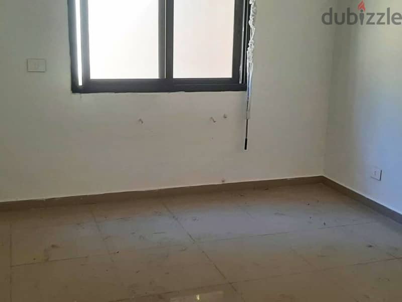 L16330-Spacious Apartment With Terrace For Sale in Bsalim 1