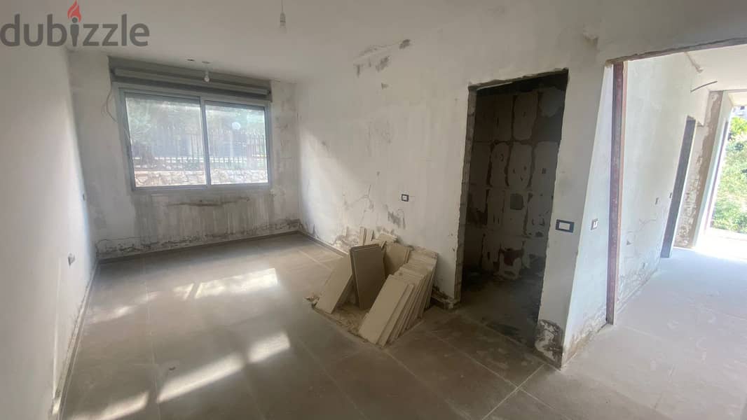 L16314-Spacious Apartment With Sea View For Sale in Beit El Chaar 1