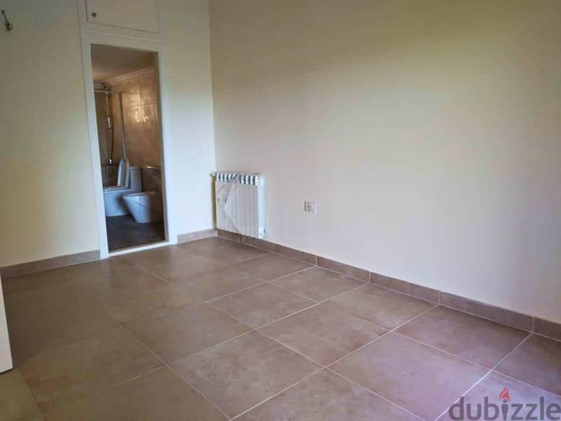 L16263-Spacious Apartment For Sale in Ghadir 2