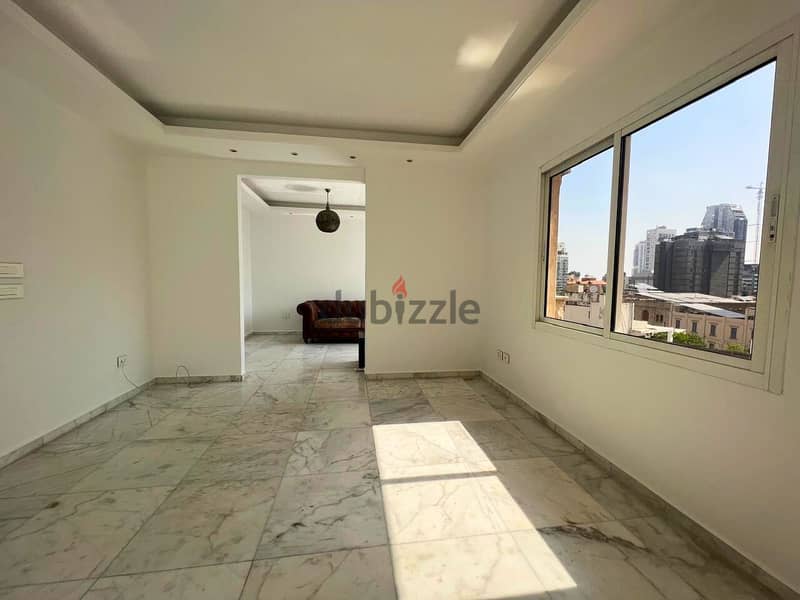 L16413-3-Bedroom Apartment with City View For Sale in Achrafieh 1