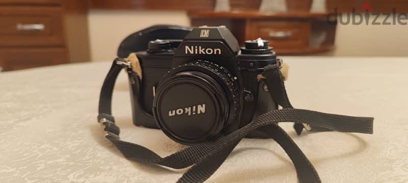 Nikon EM - 50mm/1.8 4