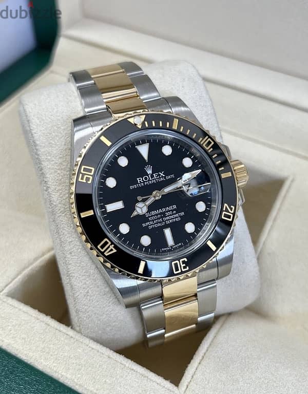 Gold and black Rolex 2