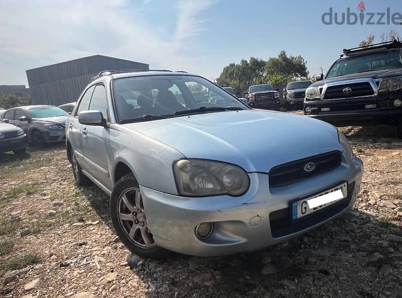 Subaru Impreza Outback 2005 V4 awd good condition 1