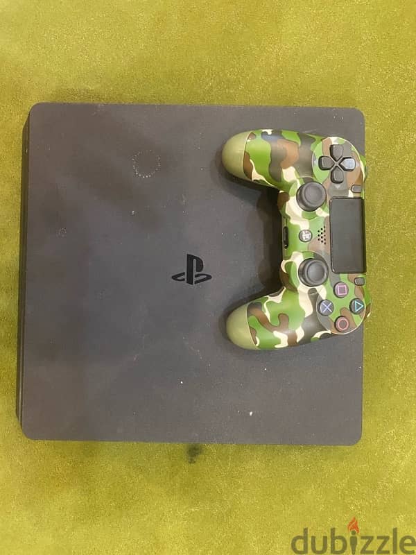 USED PS4 SLIM 1 TB MINT CONDITION. 1