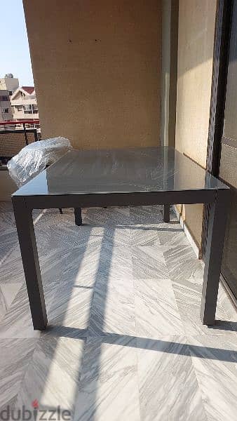 grey aluminium table with glass top 2