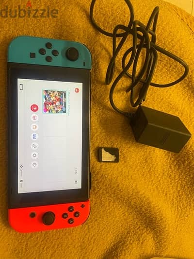 nintendo switch v1 with original charge and game