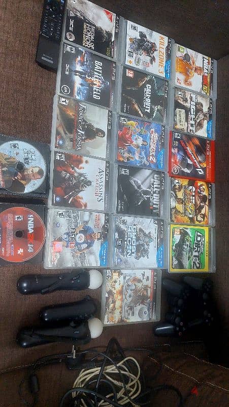 ps3 cd's plus controllers 0