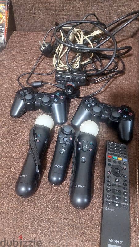 ps3 cd's plus controllers 1