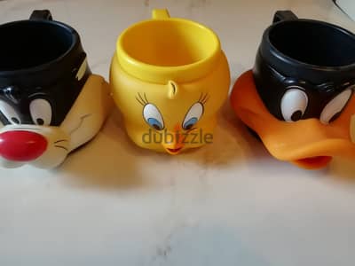 Warner brothers 1992 Looney tunes hard plastic mugs Daffy Tweety & si