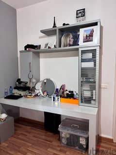 desk, shelves, and closets 0