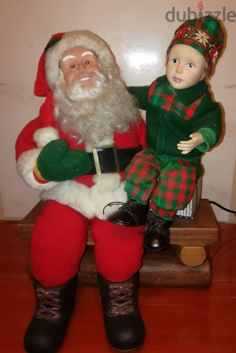 Holidays creation Christmas decoration Animated santa With kid sitting 3