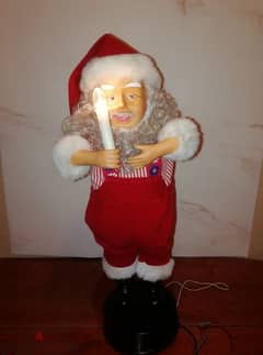 Animated Santa with music & light works on 2 D size batteries size 50 0