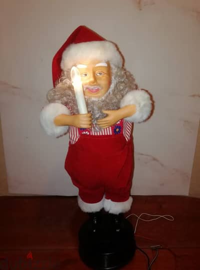 Animated Santa with music & light works on 2 D size batteries size 50