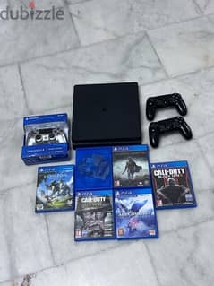 ps4 slim 1T  3 controllers  6 Games lest price 250$   71284587 0