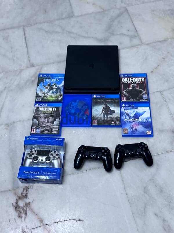 ps4 slim 1T  3 controllers  6 Games lest price 250$   71284587 1