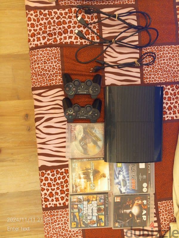 ps3 slim/2 original controllers/cables/5 video games 0