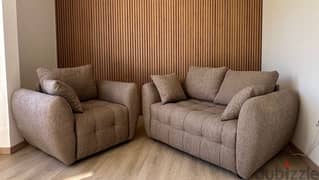 Brand new comfortable 2 sofas still in nylon 0