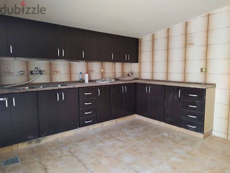 L16427-Spacious 3-Bedroom Apartment For Rent in Kfarhbeib 2