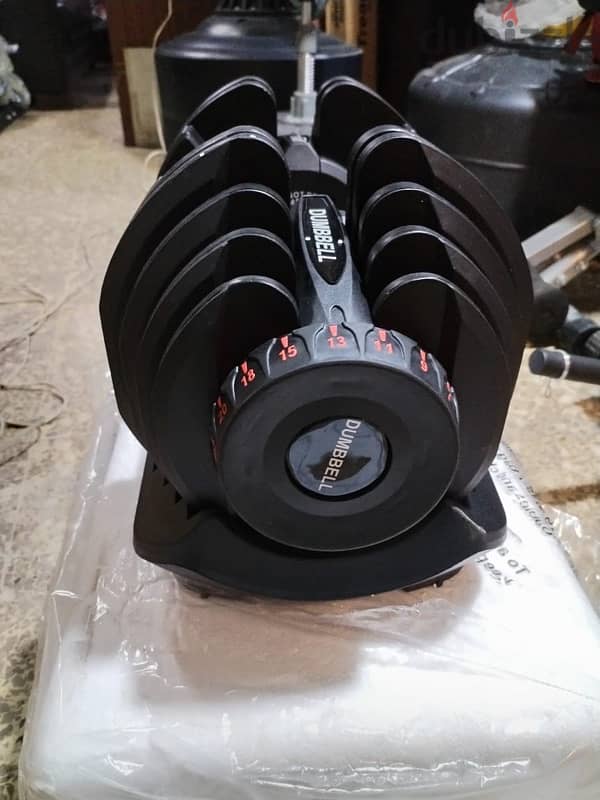 Bowflex adjustable NEW 24 & 42 kg for 220$ 1