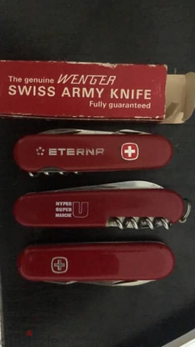 2 original wenger and 1 victorinox