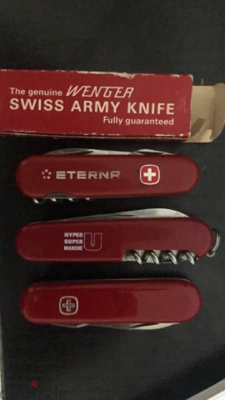 2 original wenger and 1 victorinox 0