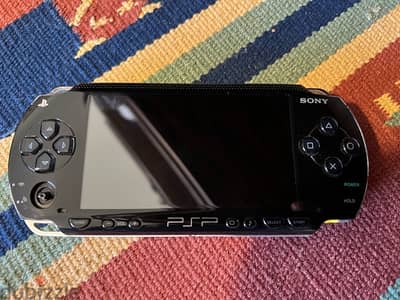 PSP  + COVER + CHARGER + GAMES