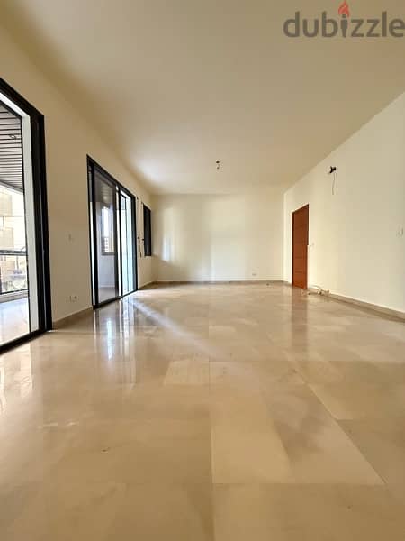 Spacious Apartment for rent in Achrafieh W/ Balcony. 1