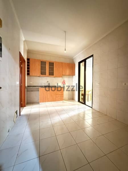 Spacious Apartment for rent in Achrafieh W/ Balcony. 4