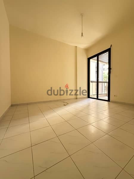 Spacious Apartment for rent in Achrafieh W/ Balcony. 13