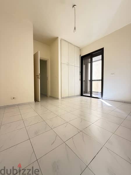 Spacious Apartment for rent in Achrafieh W/ Balcony. 14