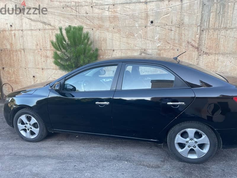 Kia Cerato 2011 4