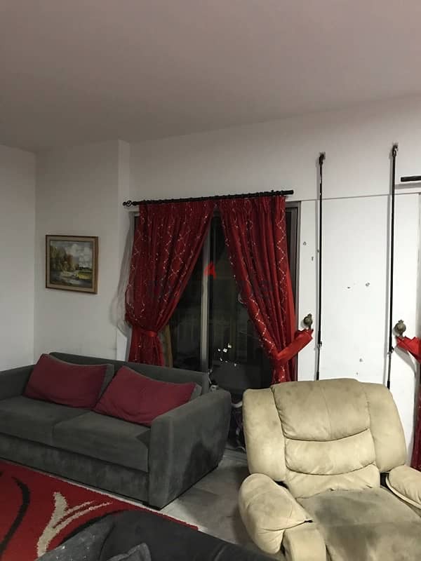 Seating Room (Couches + carpets+ curtains ) 5